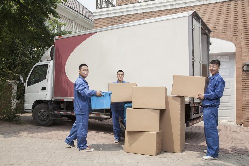 Packed boxes and furniture ready for a local house move in Burntoak