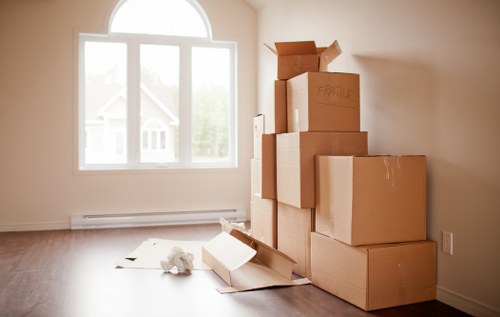 Moving van and packed boxes for a home move in Burntoak