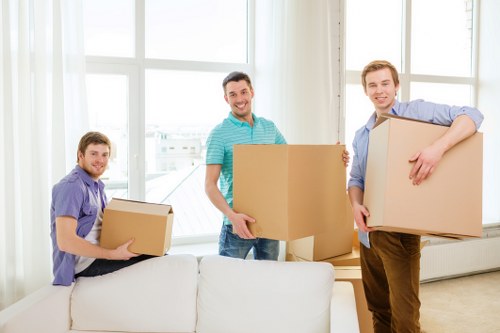 Local removal team handling furniture in Burntoak