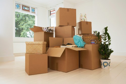 Professional movers handling furniture during a Burntoak house removal