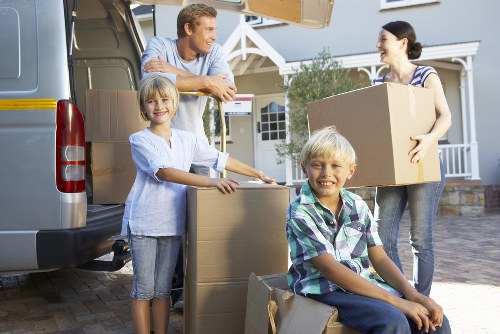 Local moving van handling furniture and boxes in Burntoak