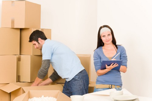Local movers loading boxes and furniture in Burntoak