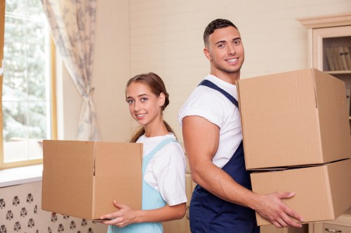 Packed office furniture and equipment ready for transport in Burntoak