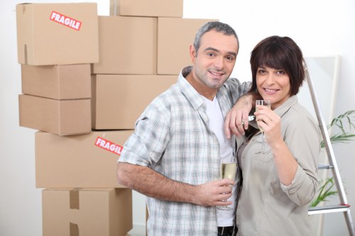 Removalists loading furniture for a Burntoak house move